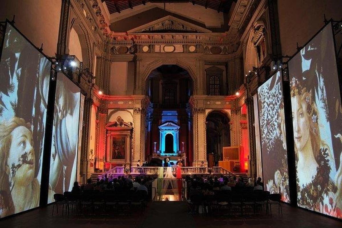 a large room with a stage in a building