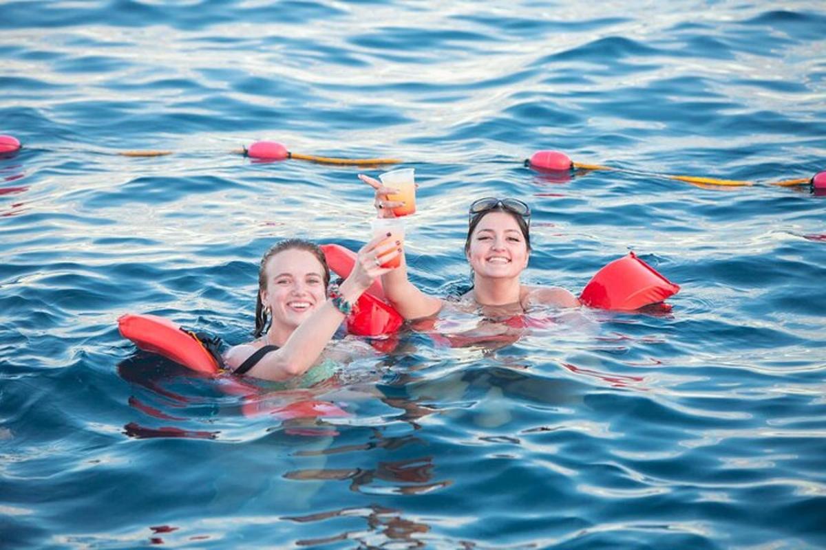 two girls are in the water in the water