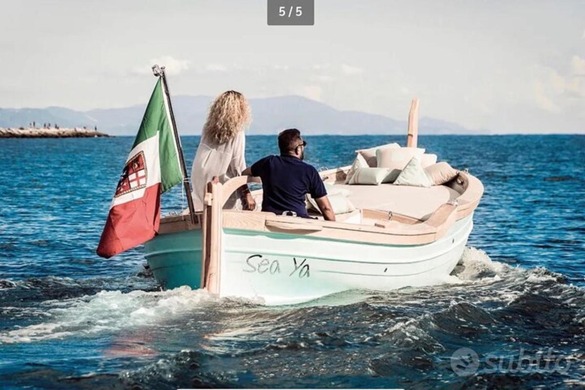 a man and a woman on a boat in the water
