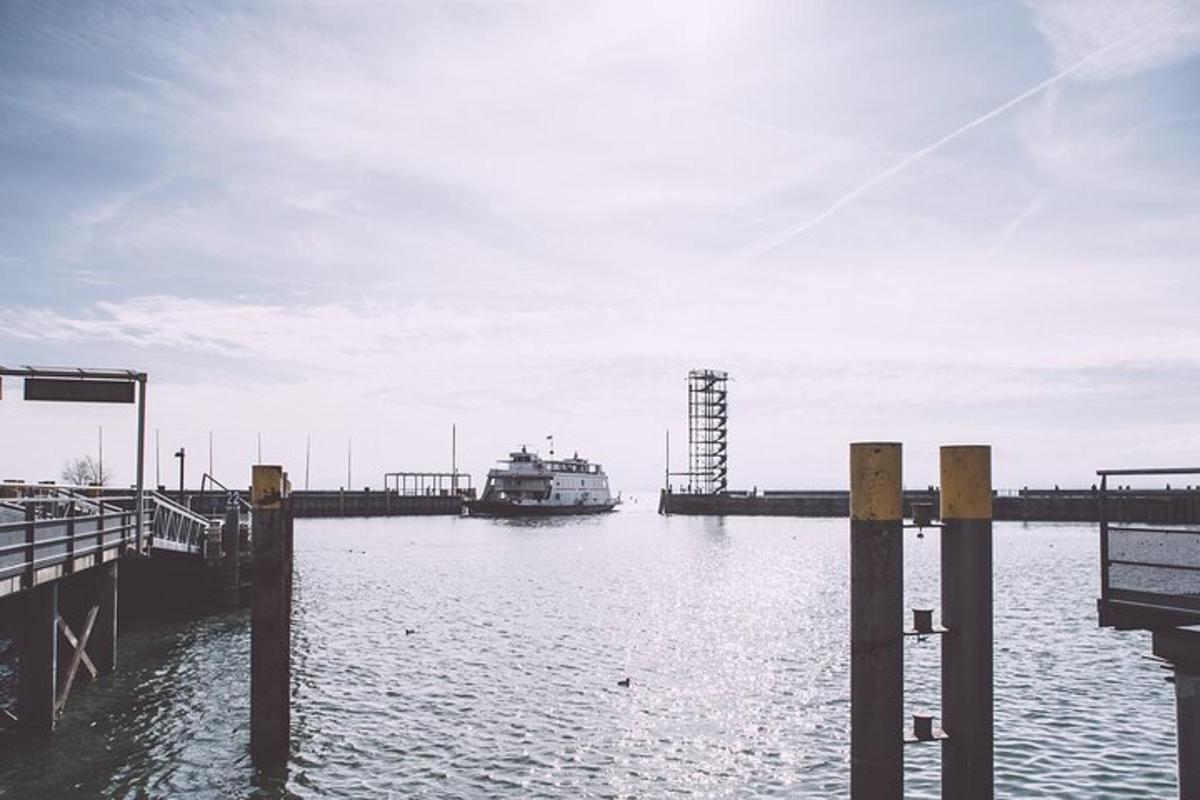 a boat is docked at a dock in the water