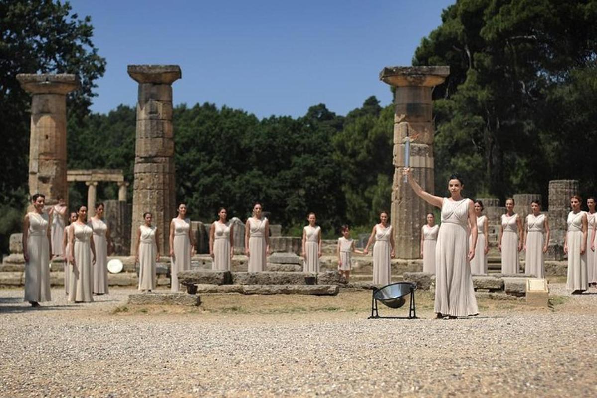 a woman standing in front of a group of people
