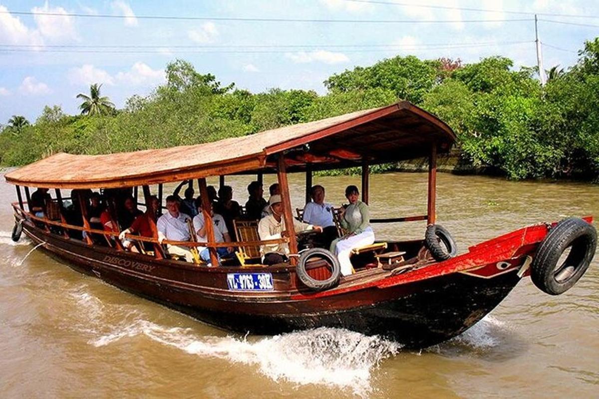 a group of people riding on a boat in the water