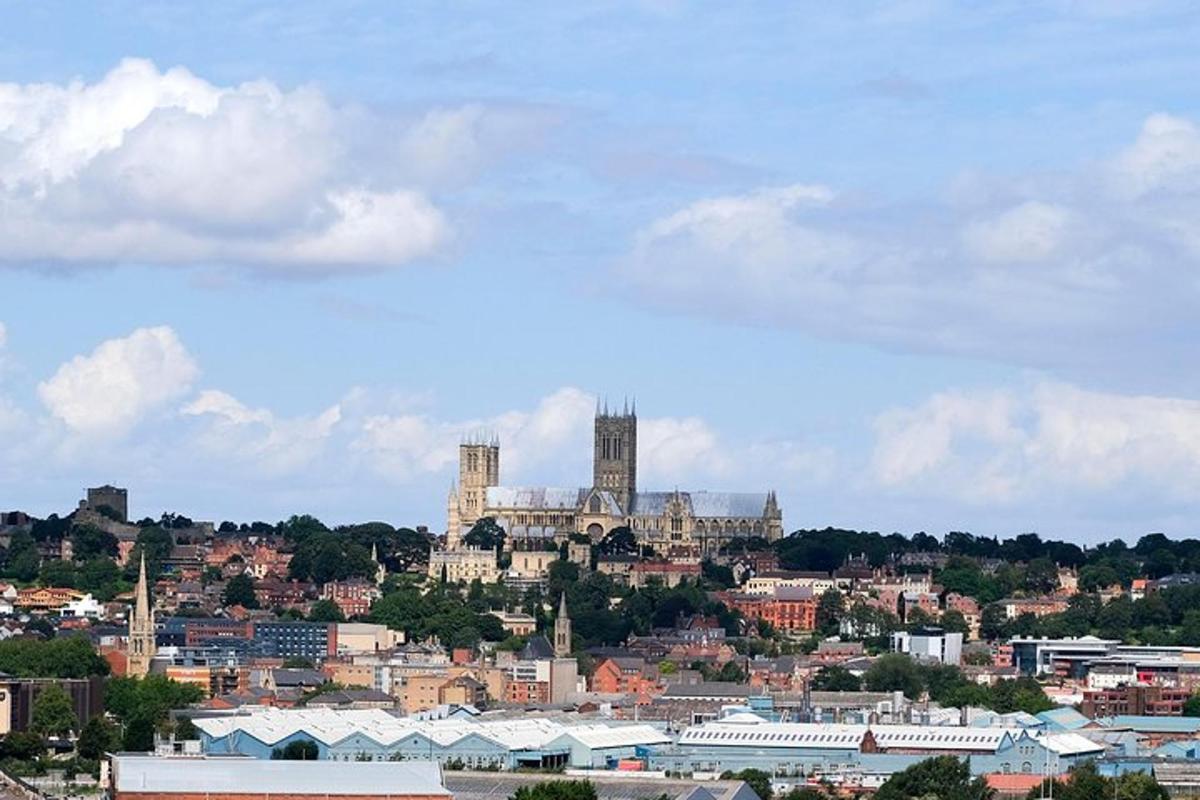 a view of a city with a castle in the background