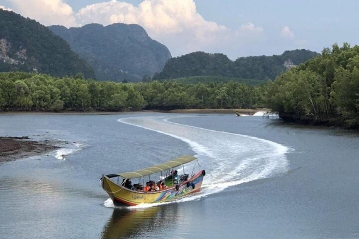 a boat with people on it on a river