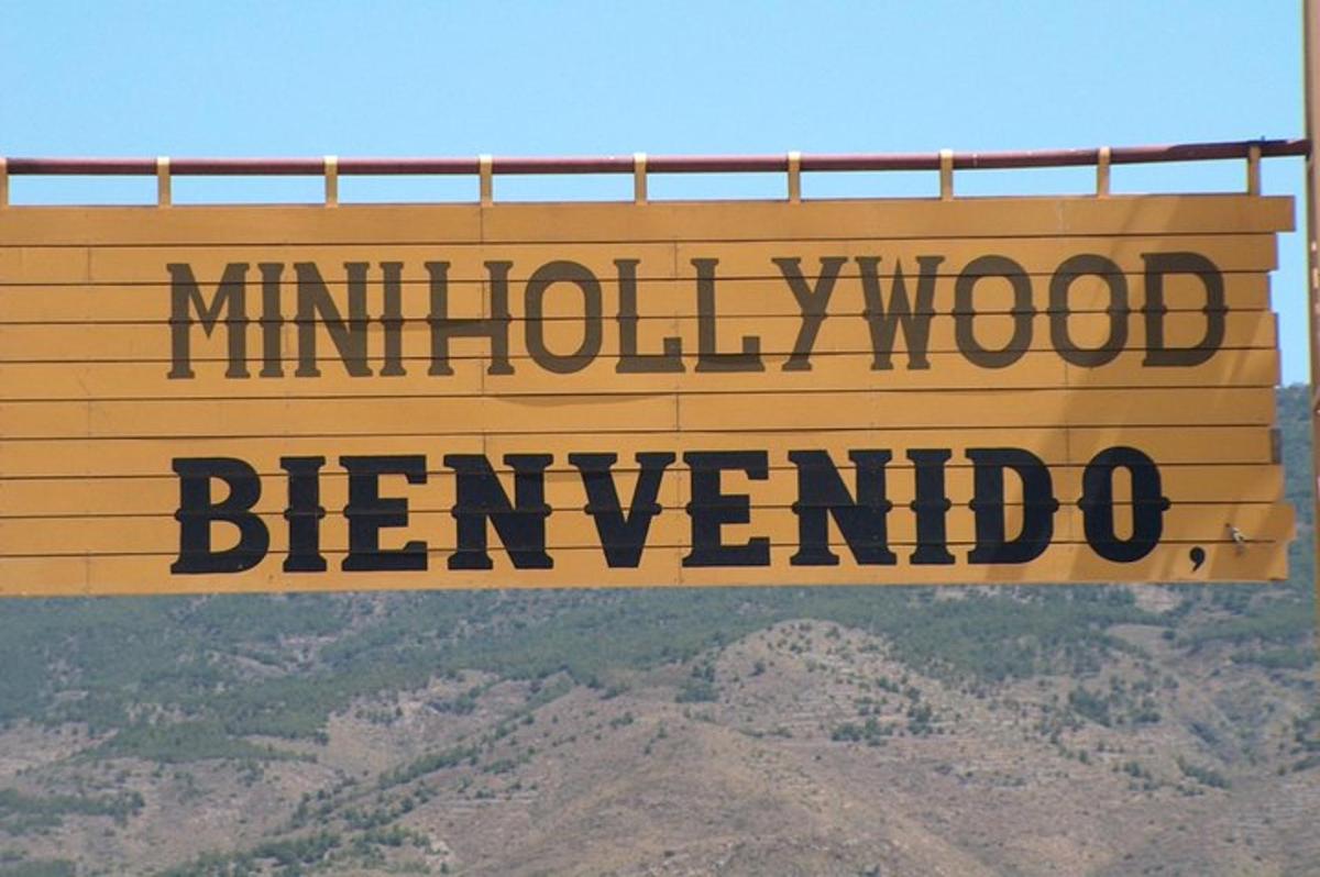 a wooden sign that reads milfordheim benvellino