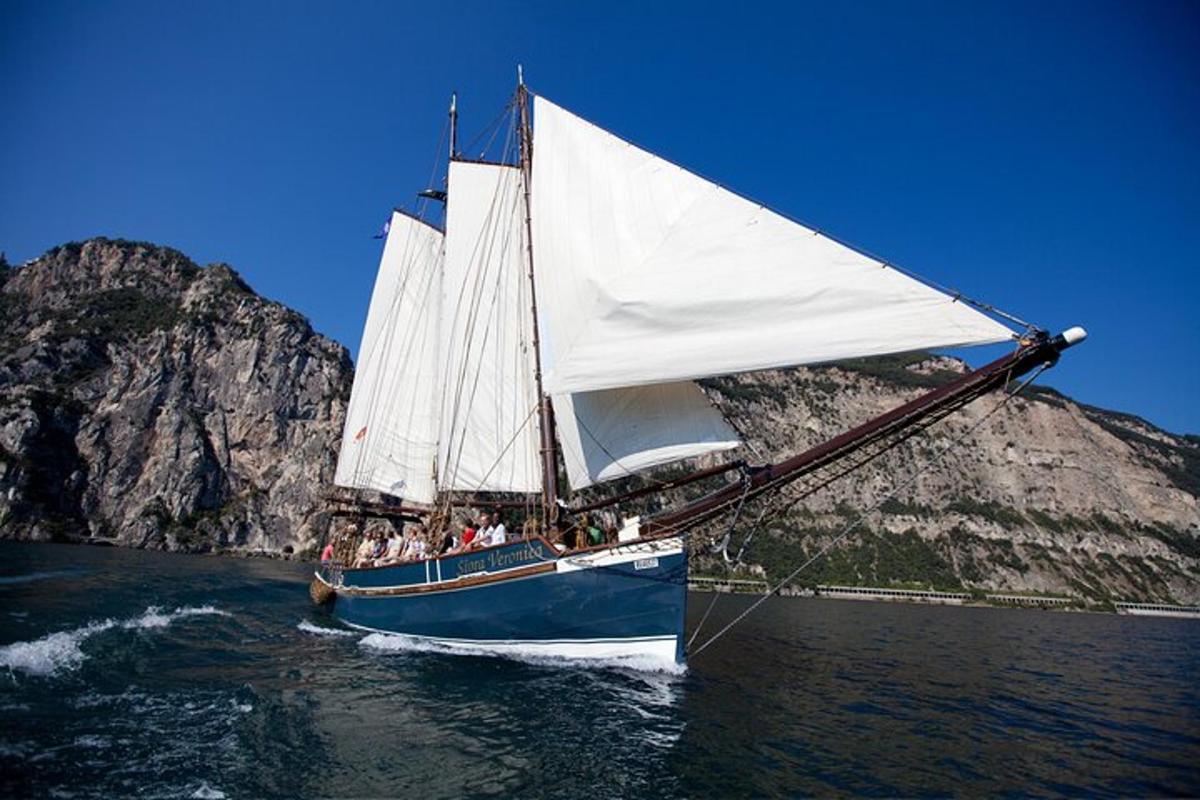 a group of people on a boat in the water