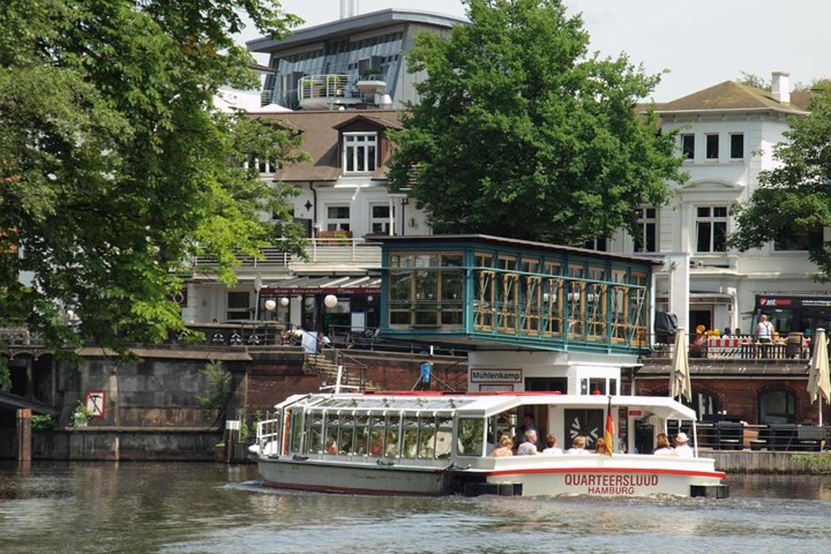 a boat in the water with a building on top