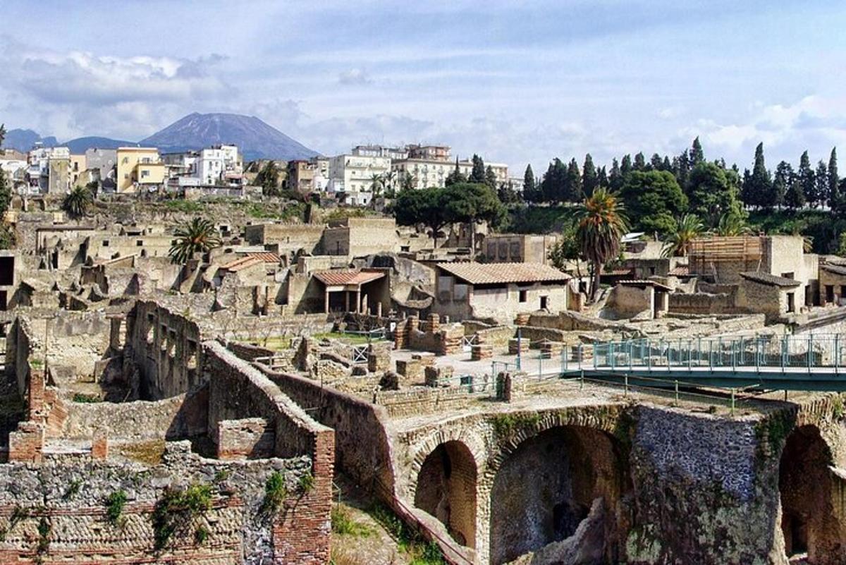 an ancient city with a bridge and buildings