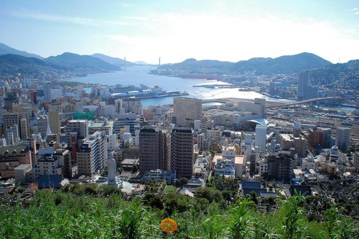 a view of a city with a river and buildings
