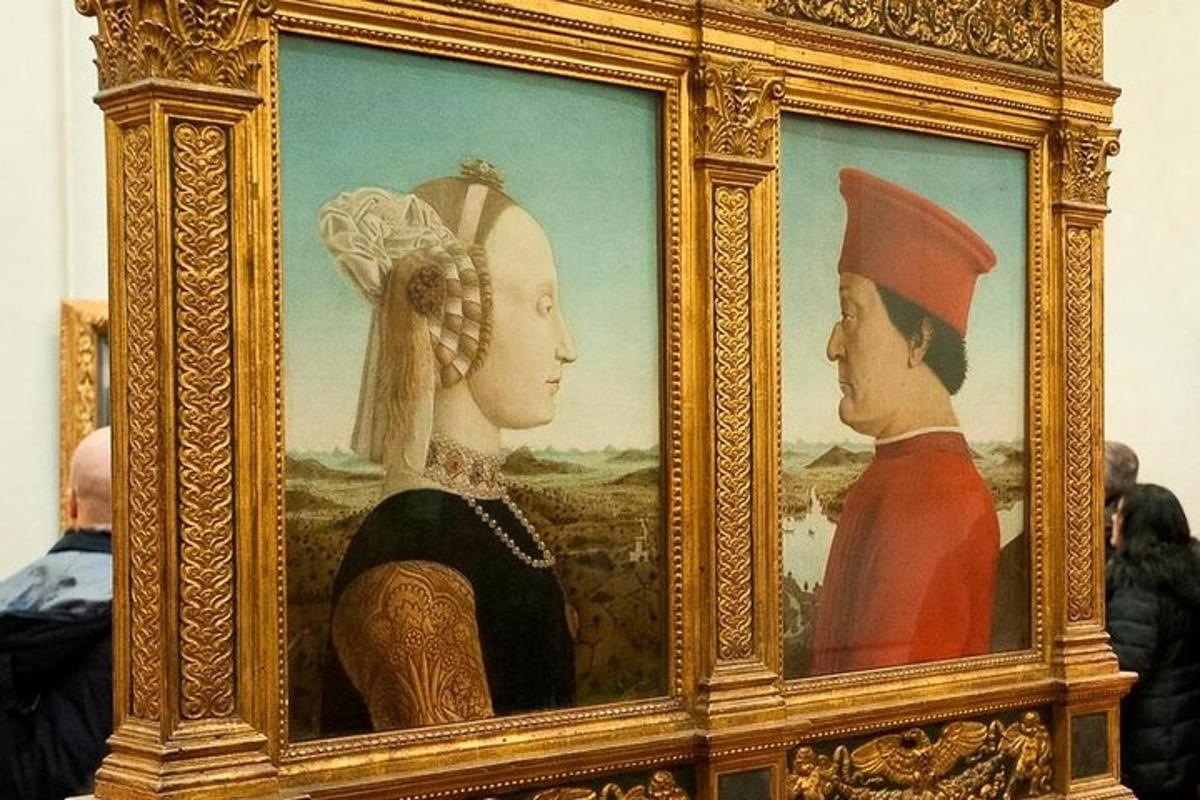 a framed painting of a man and a woman