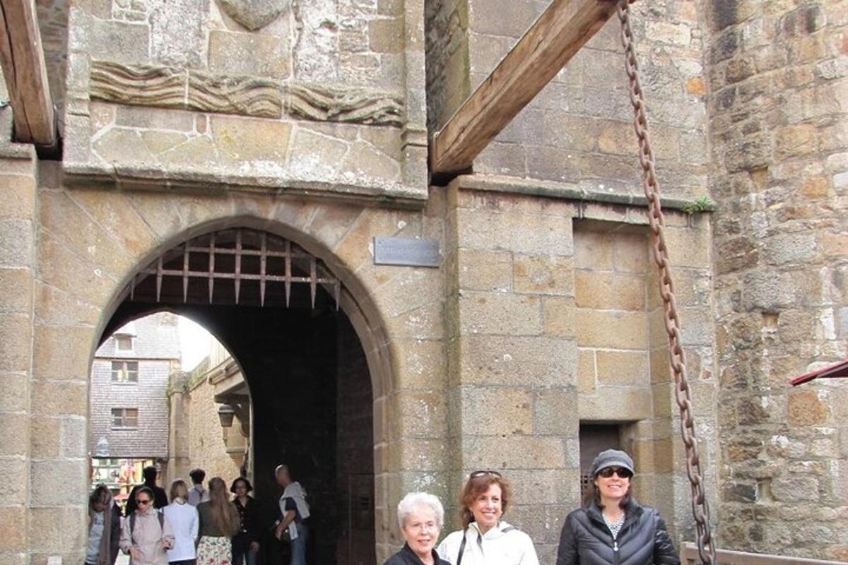 a group of people standing outside of a building