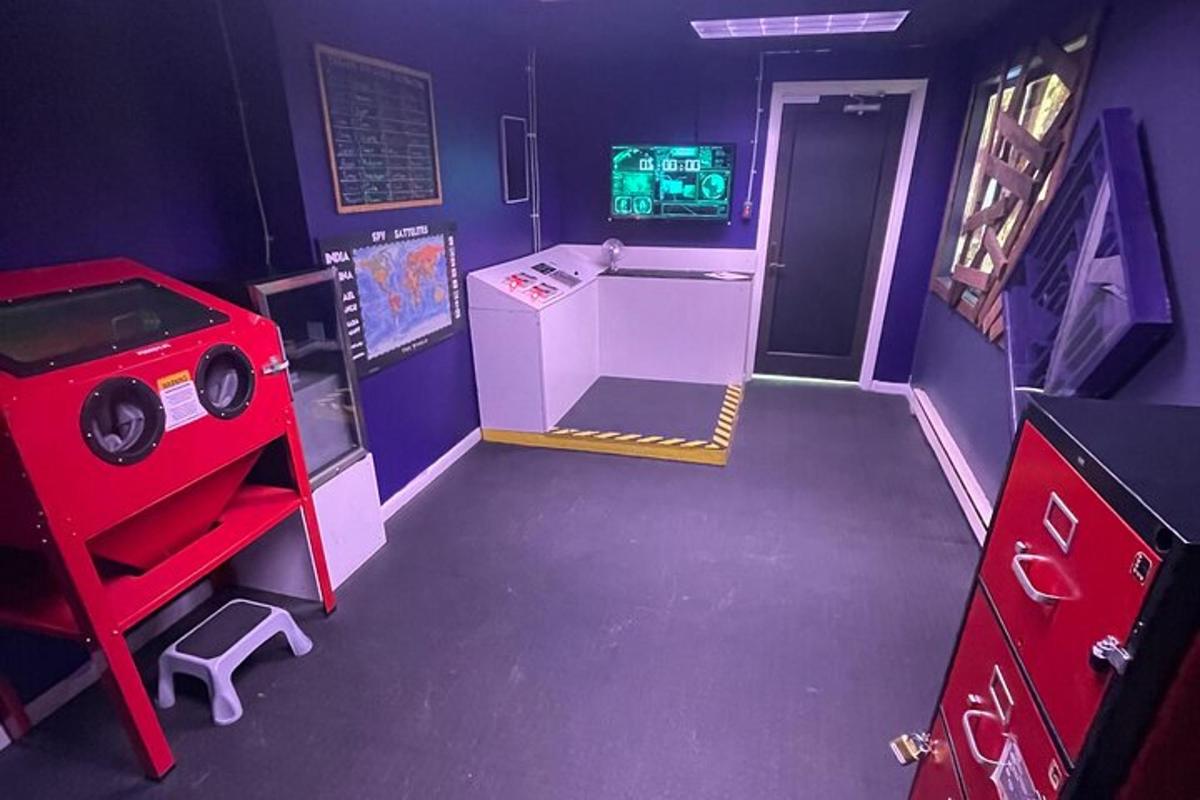 a room with a video game room with a game console