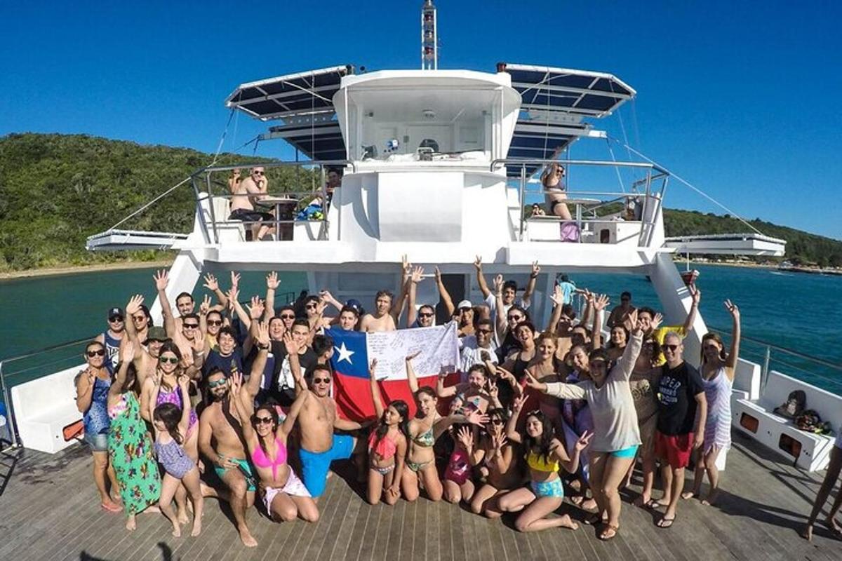 a group of people posing for a picture on a boat