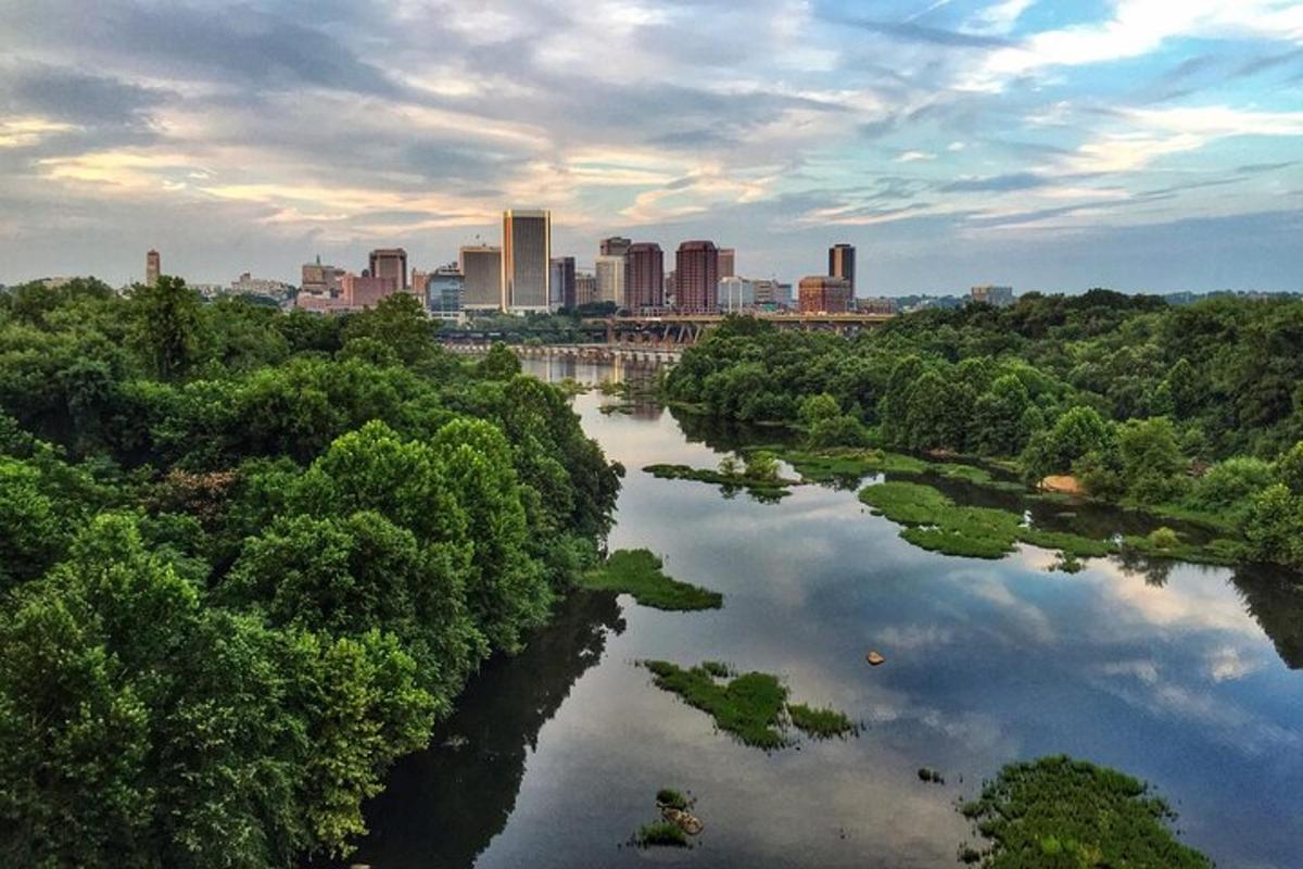 a view of a river with a city in the background