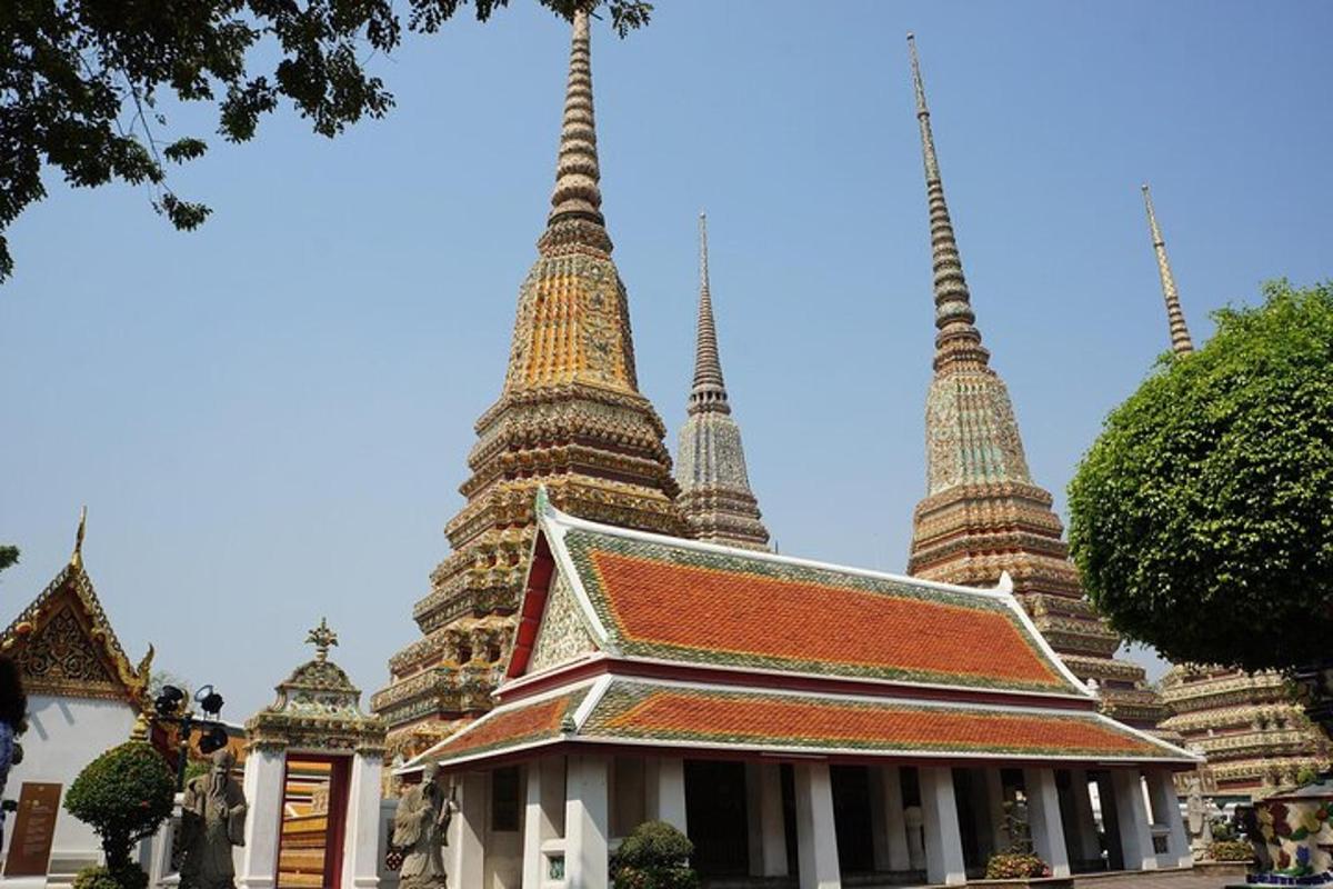 a temple with three towers in the background