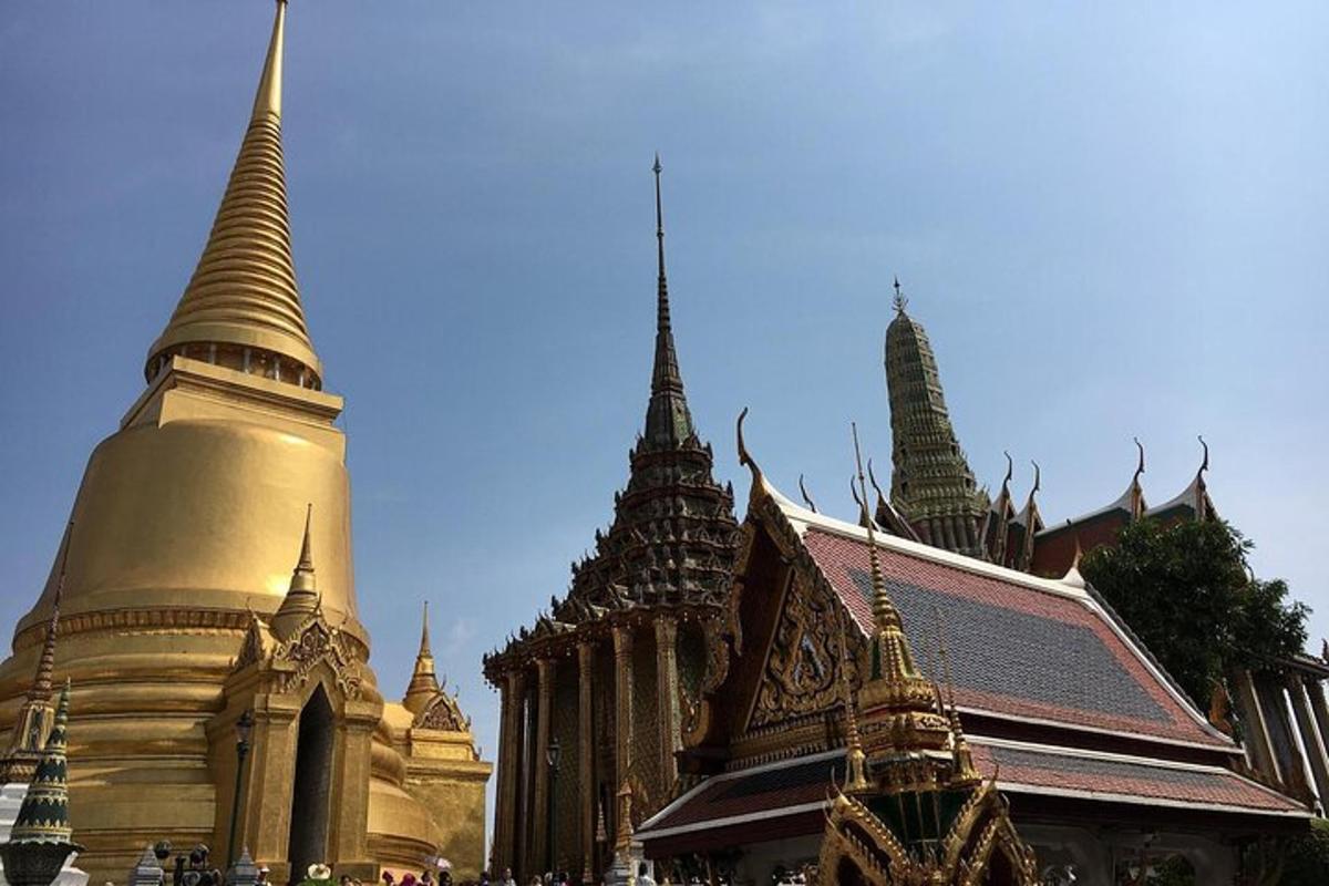 a group of buildings with spires on top of them