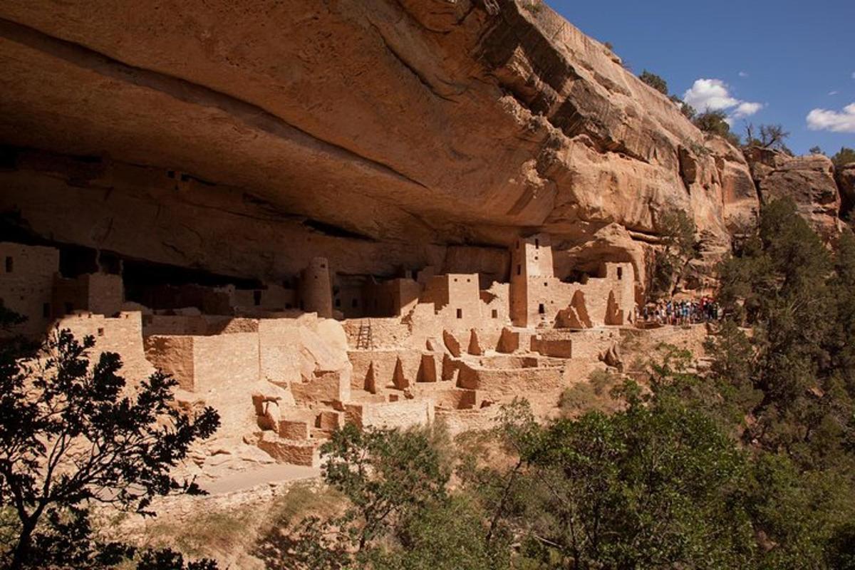 a castle built into the side of a mountain
