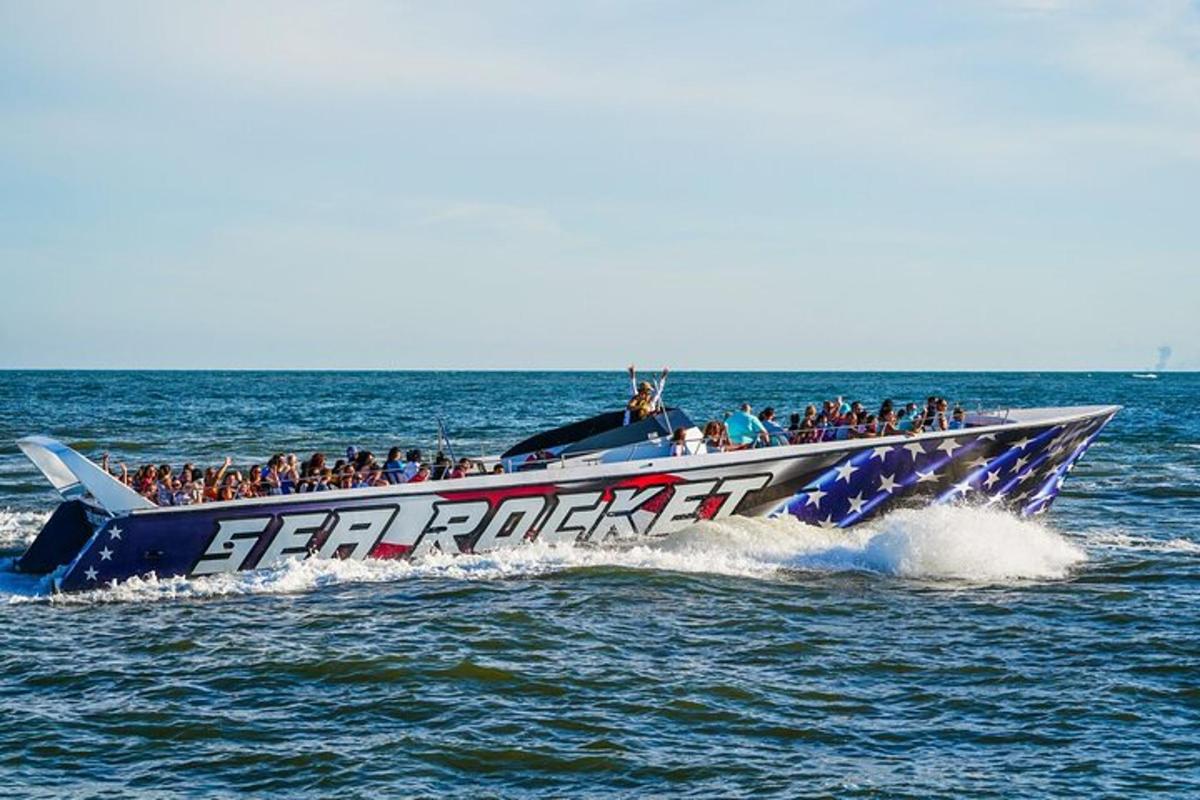a group of people on a boat in the water