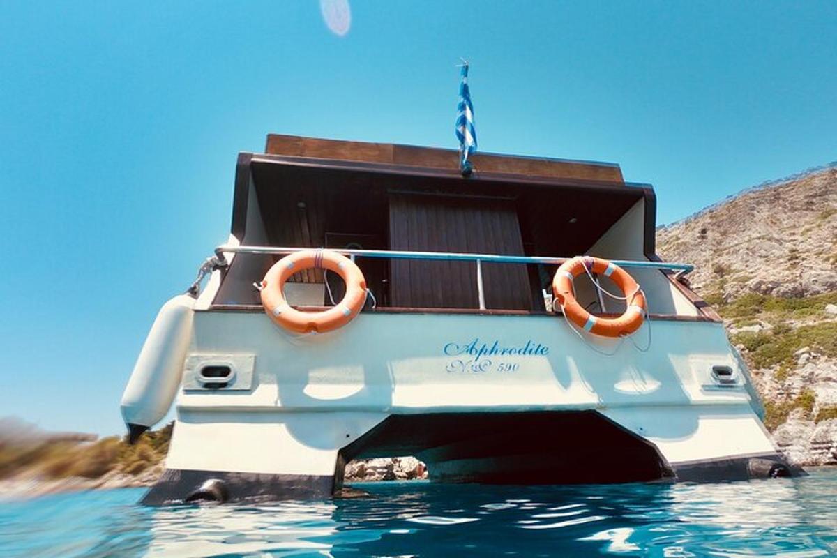 a boat in the water with two life rings on it