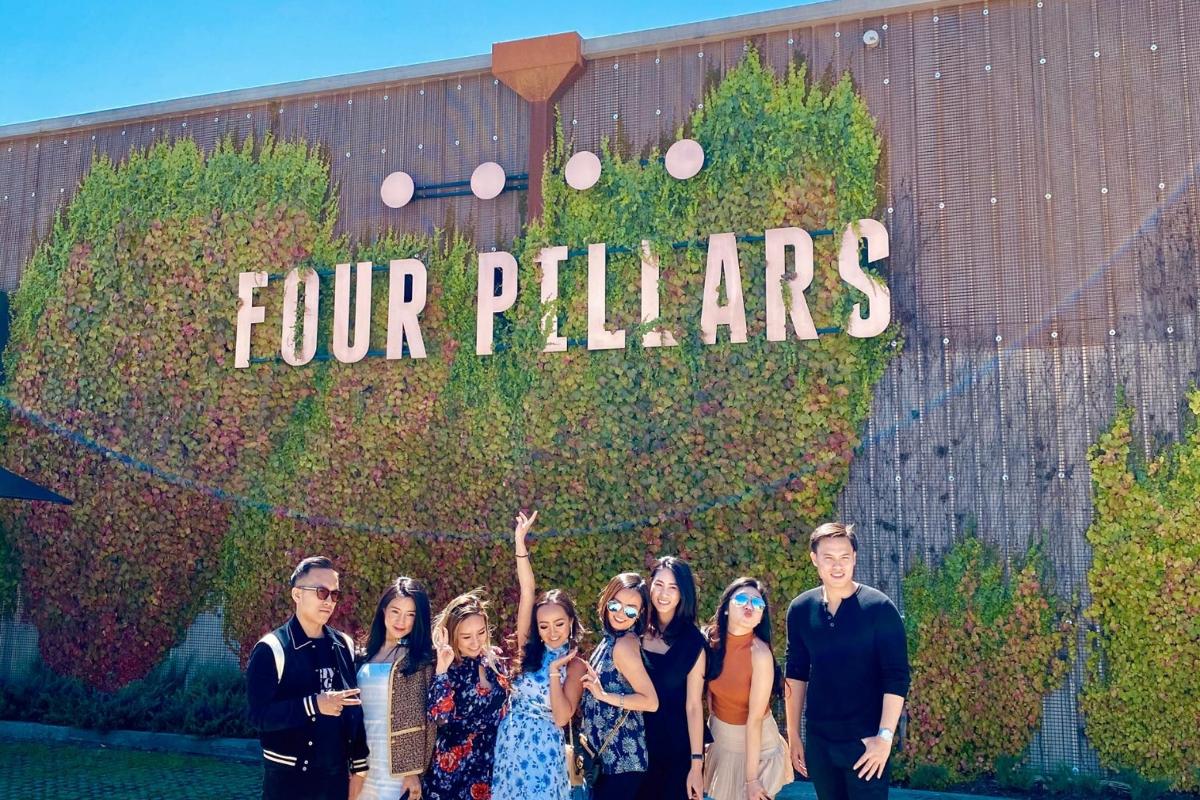 a group of people standing in front of a building