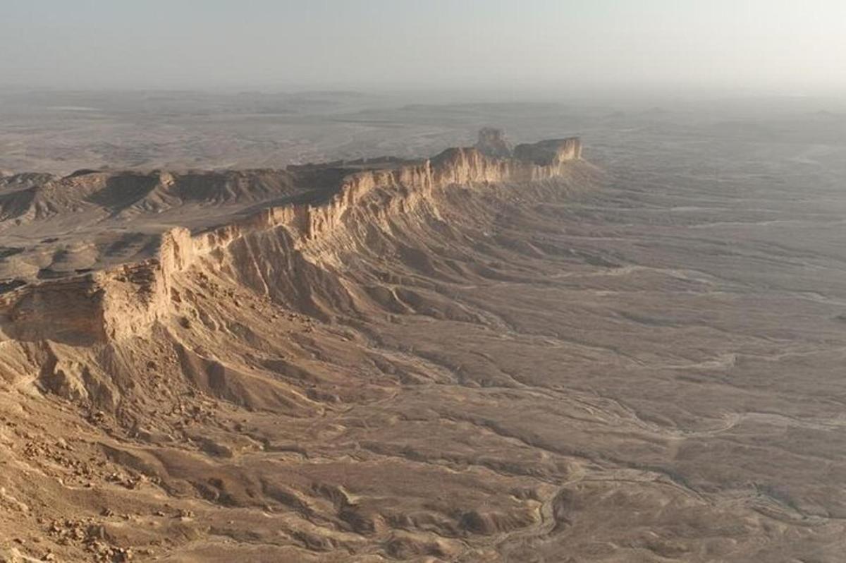 an aerial view of a mountain in the desert