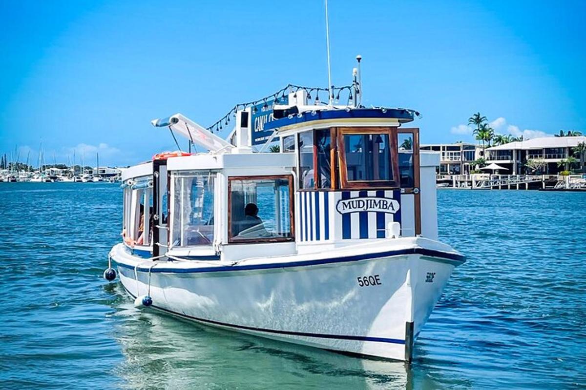 a white boat in the water on the water
