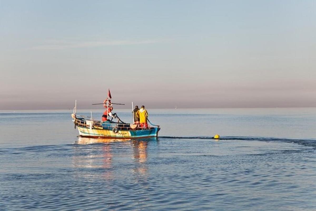 two people on a boat in the water
