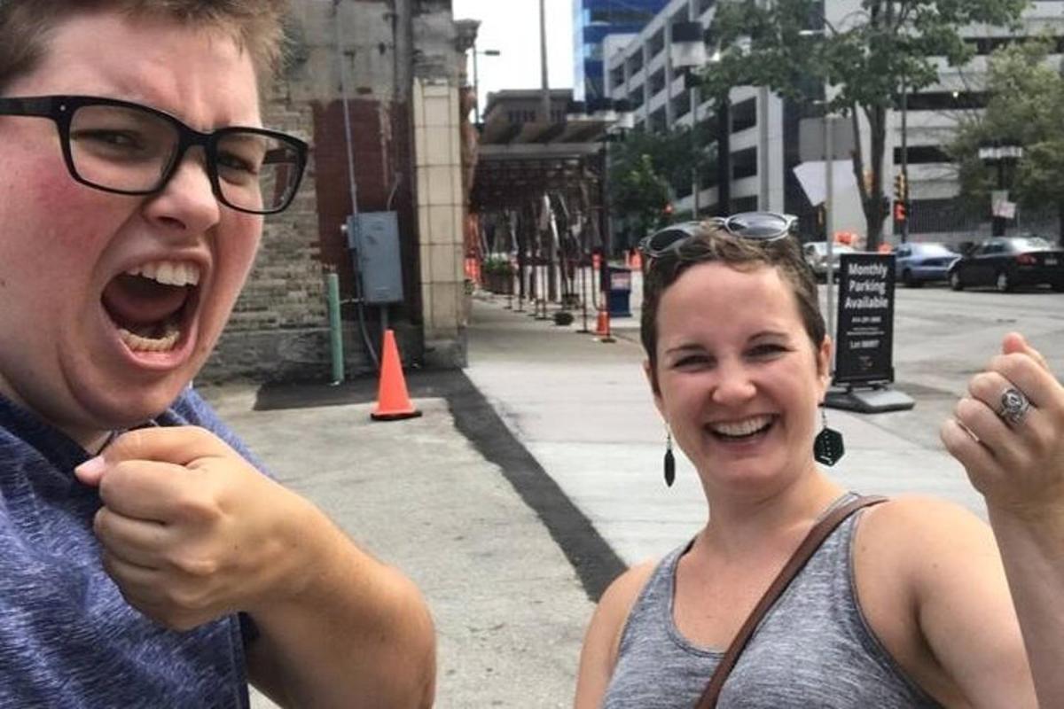 a man and a woman posing for a picture