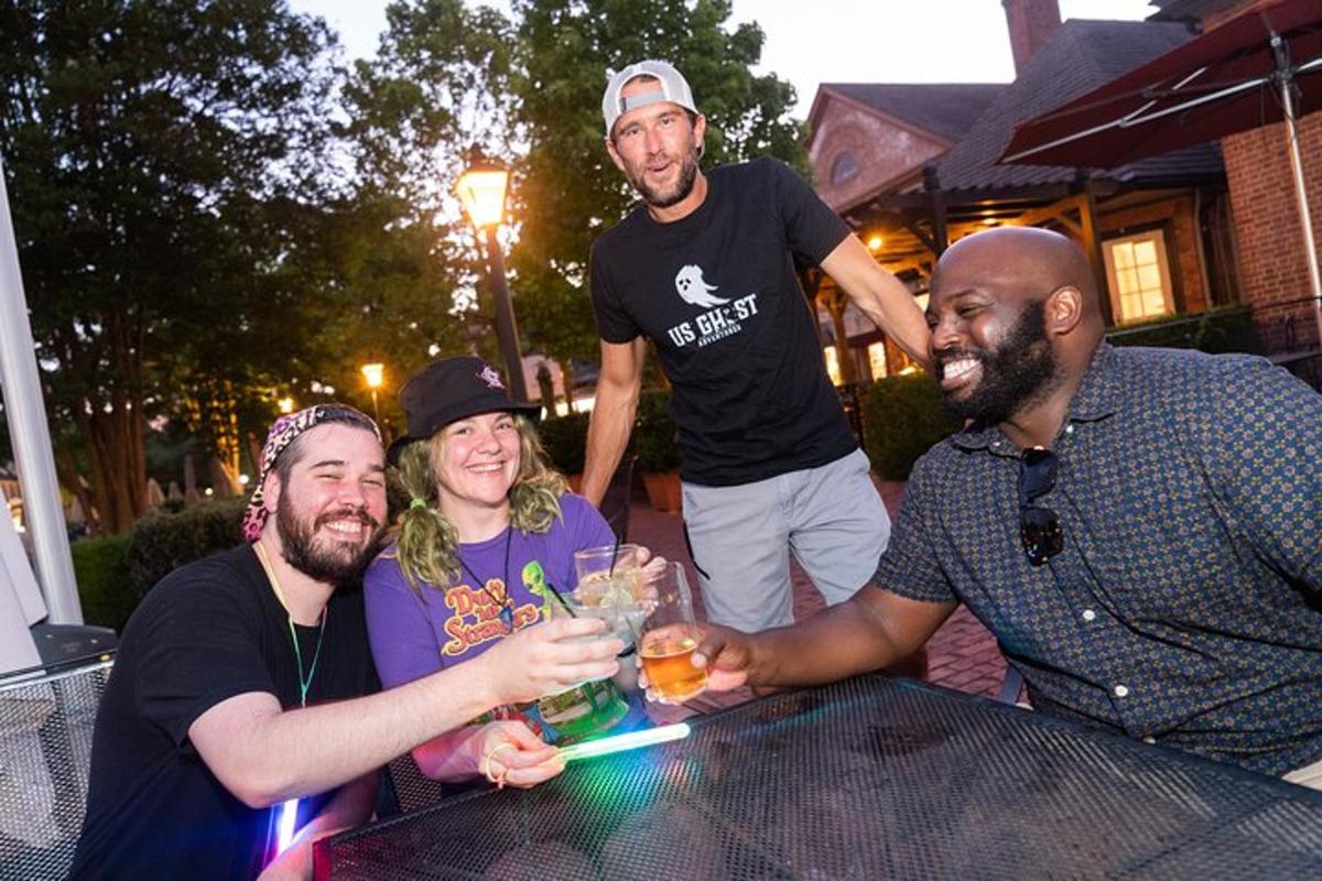 a group of people sitting at a table with drinks
