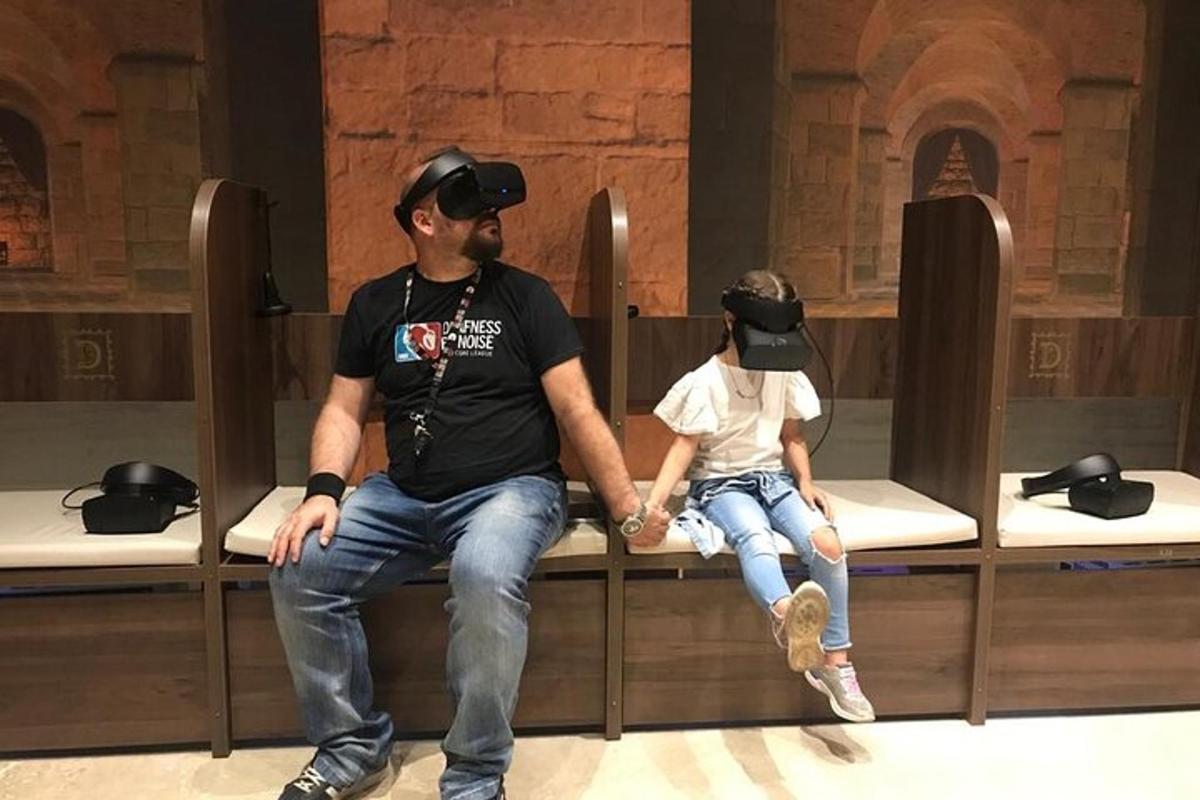 a man and a little girl sitting on a bench