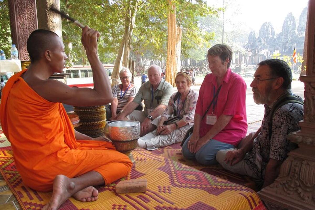 a group of people sitting around each other
