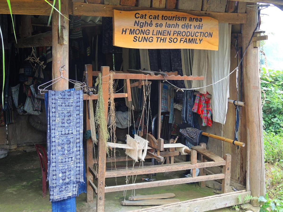 a store with a sign on the side of a building