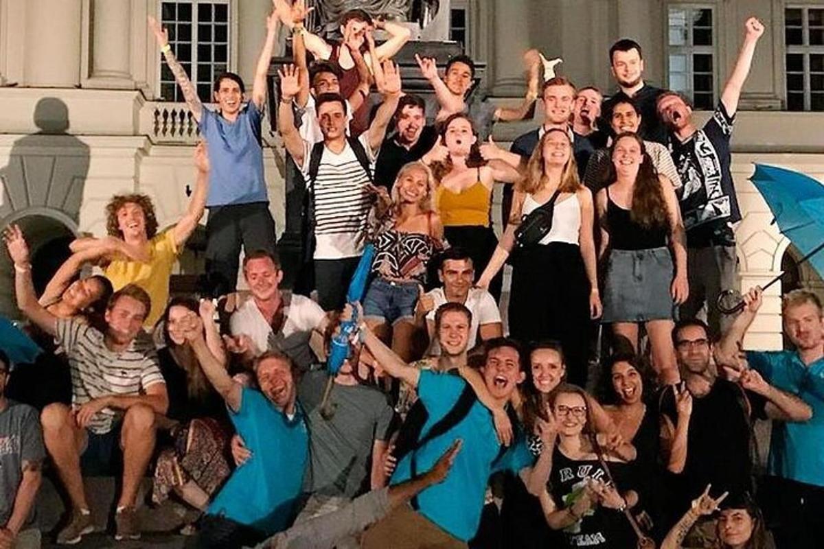 a large group of people posing for a picture