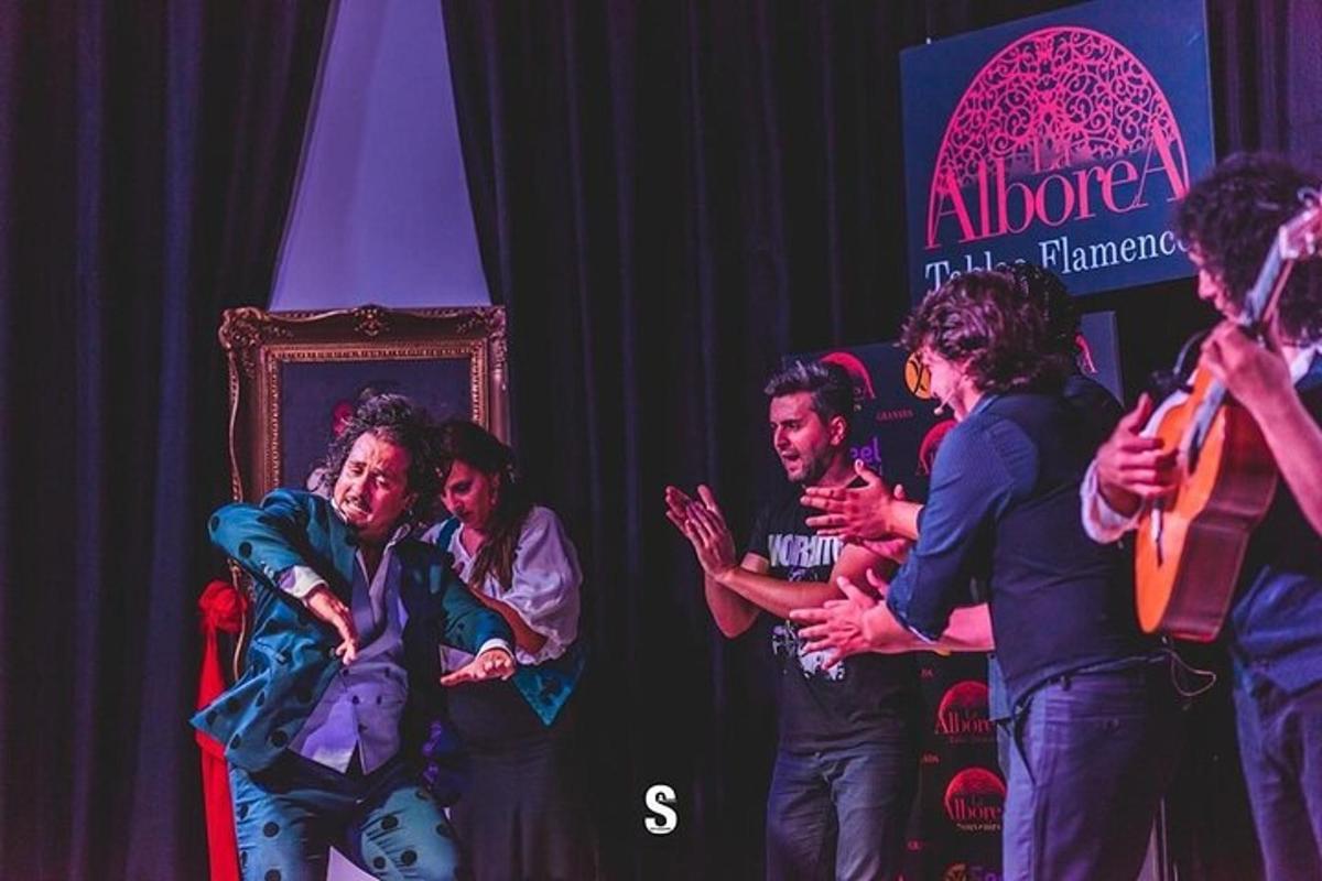 a group of people sitting on a stage