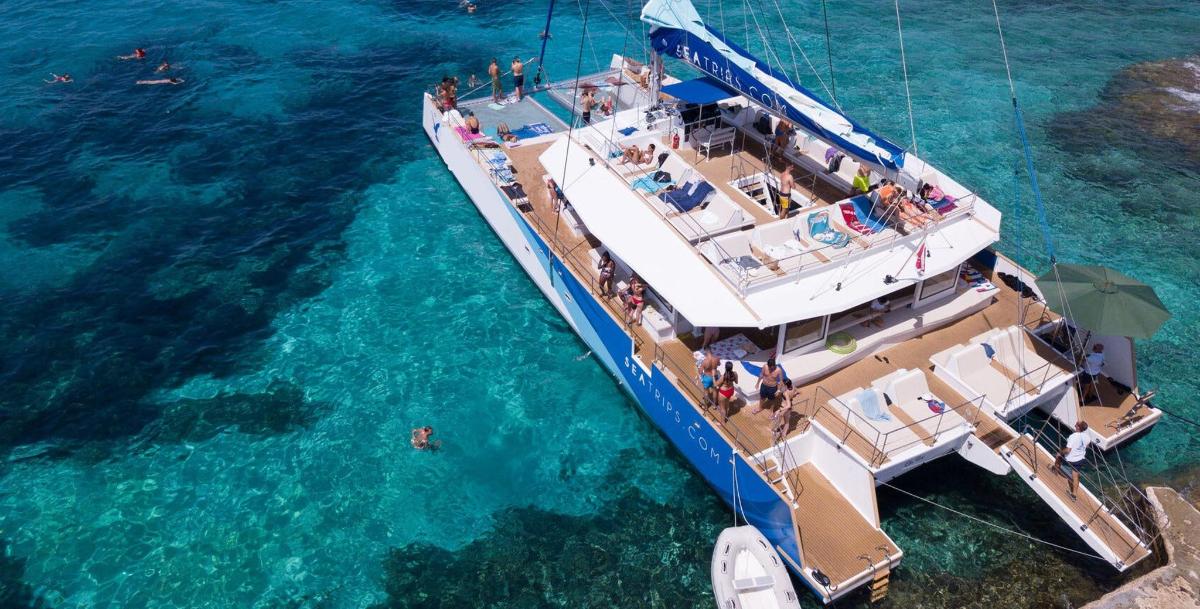 a boat in the water with people on it