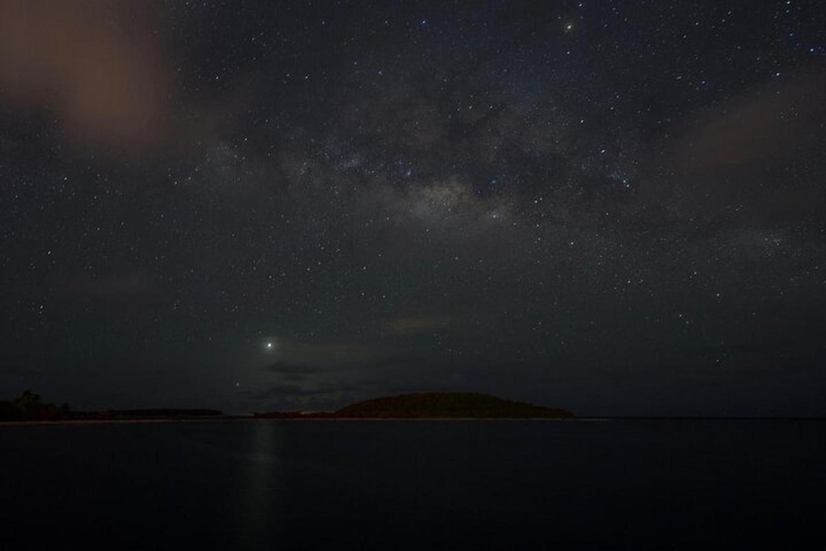 a starry night with the milky way over the ocean