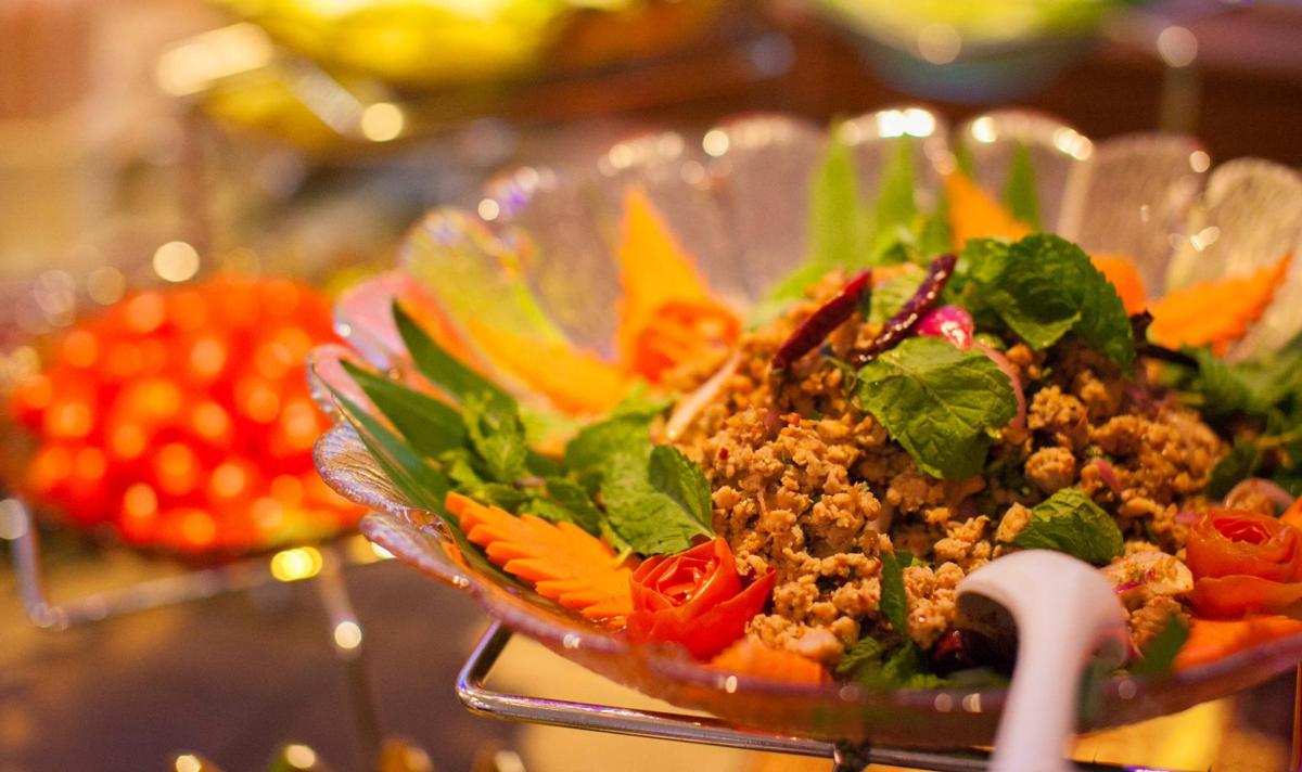 a salad in a glass bowl on a table