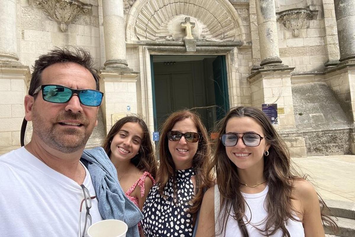 a group of people standing in front of a building