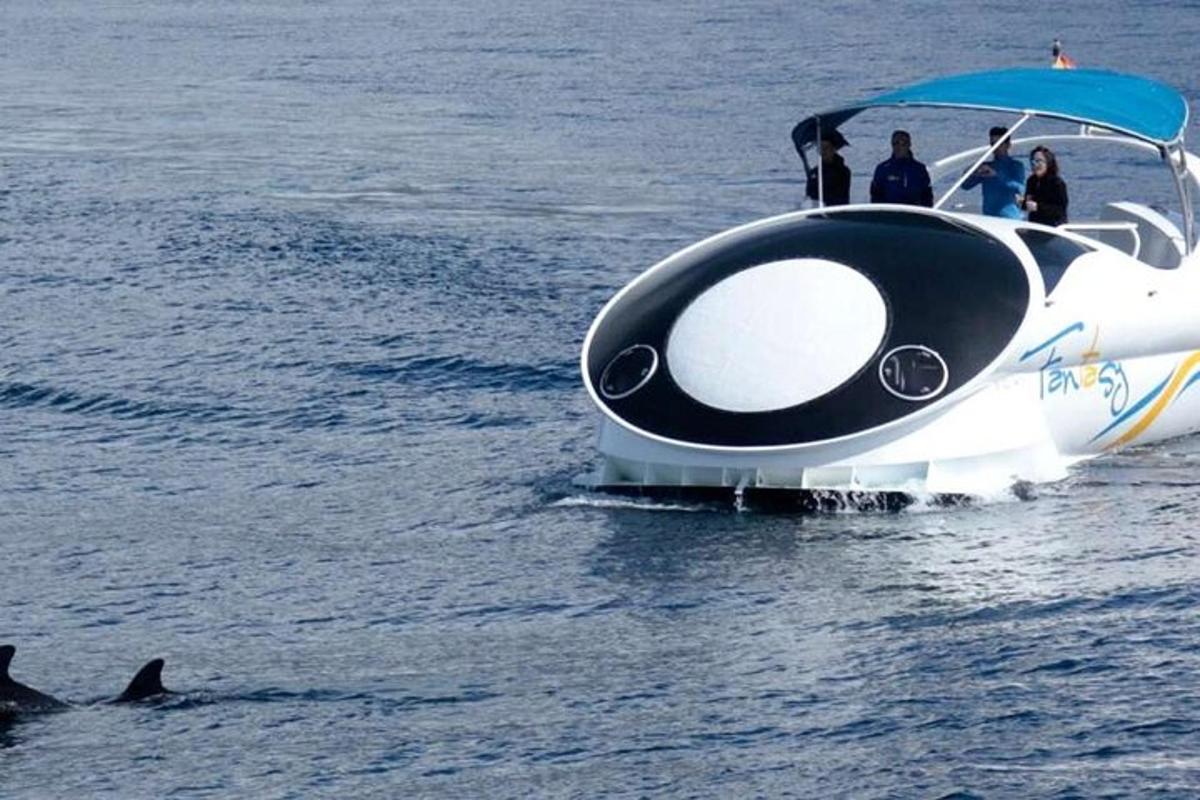 a group of people on a boat in the water