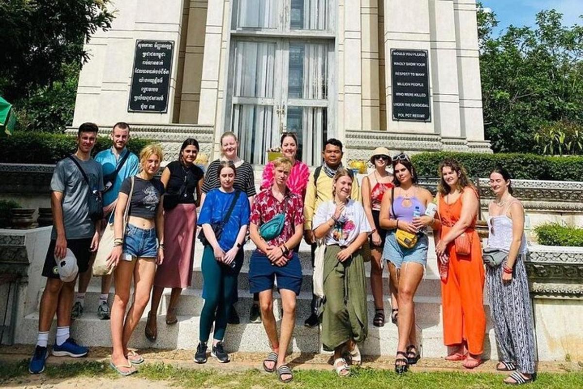 a group of people standing in front of a building