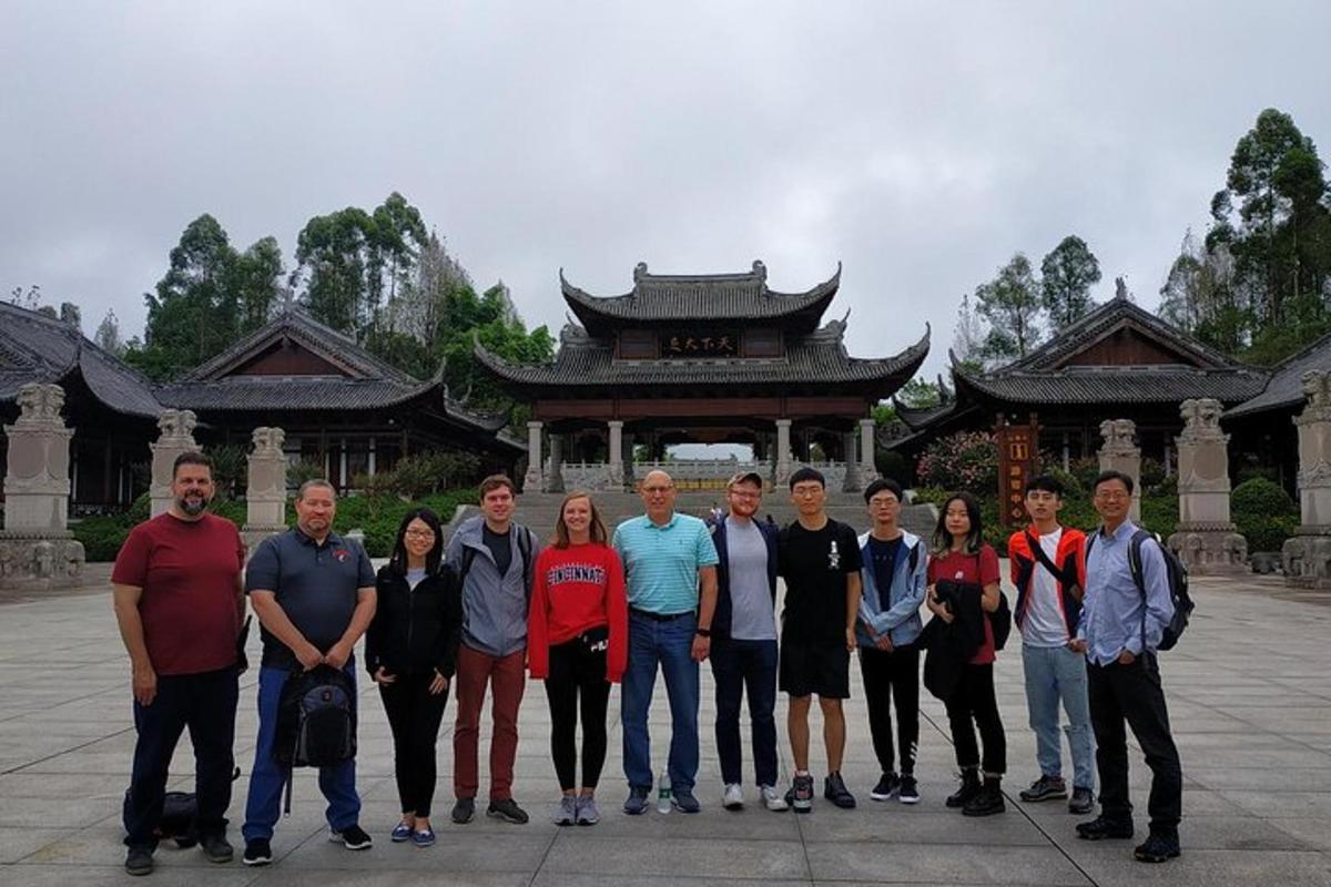 a group of people standing in front of a building