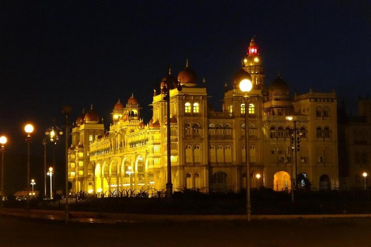 a large building with a clock tower at night