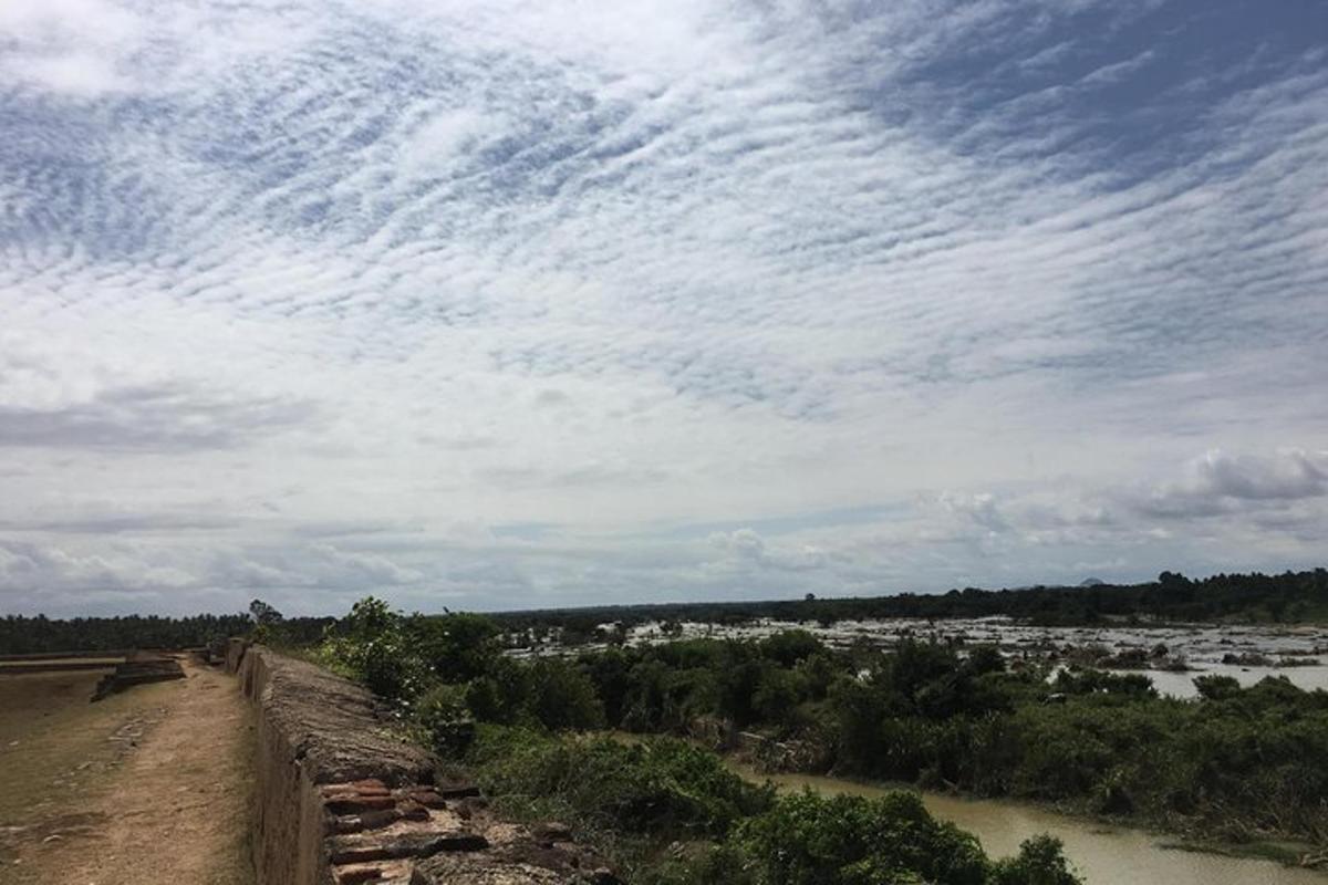 a view of a river with a cloudy sky