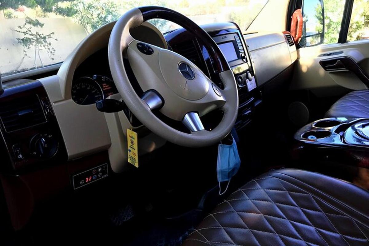 a view of the steering wheel of a car