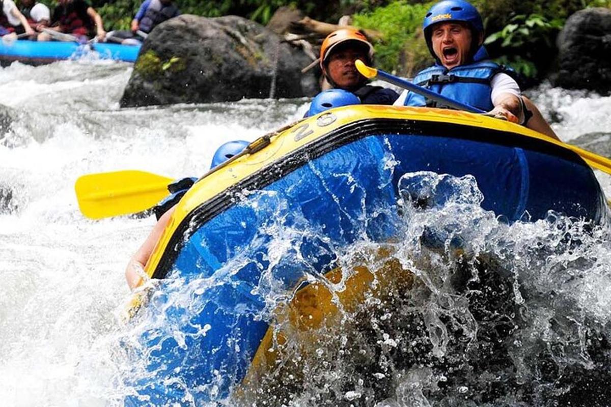 a man is in a raft on a river