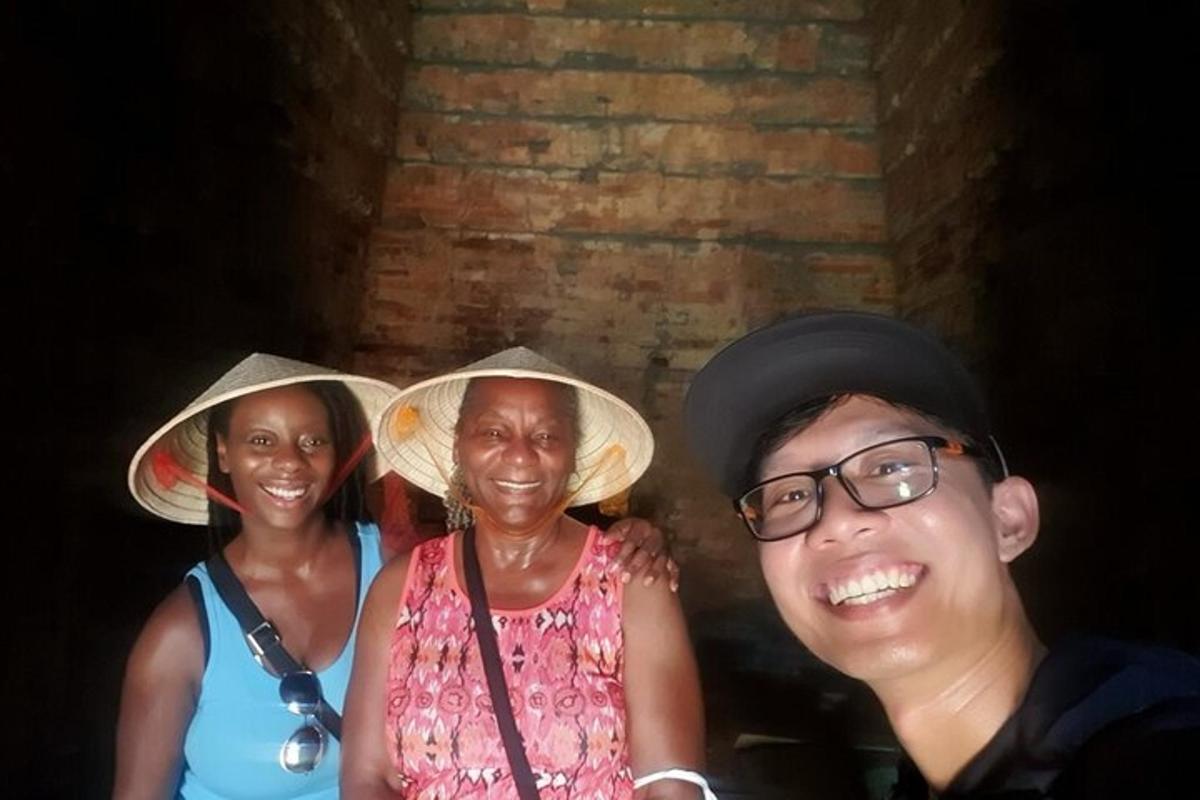 three women wearing hats posing for a picture