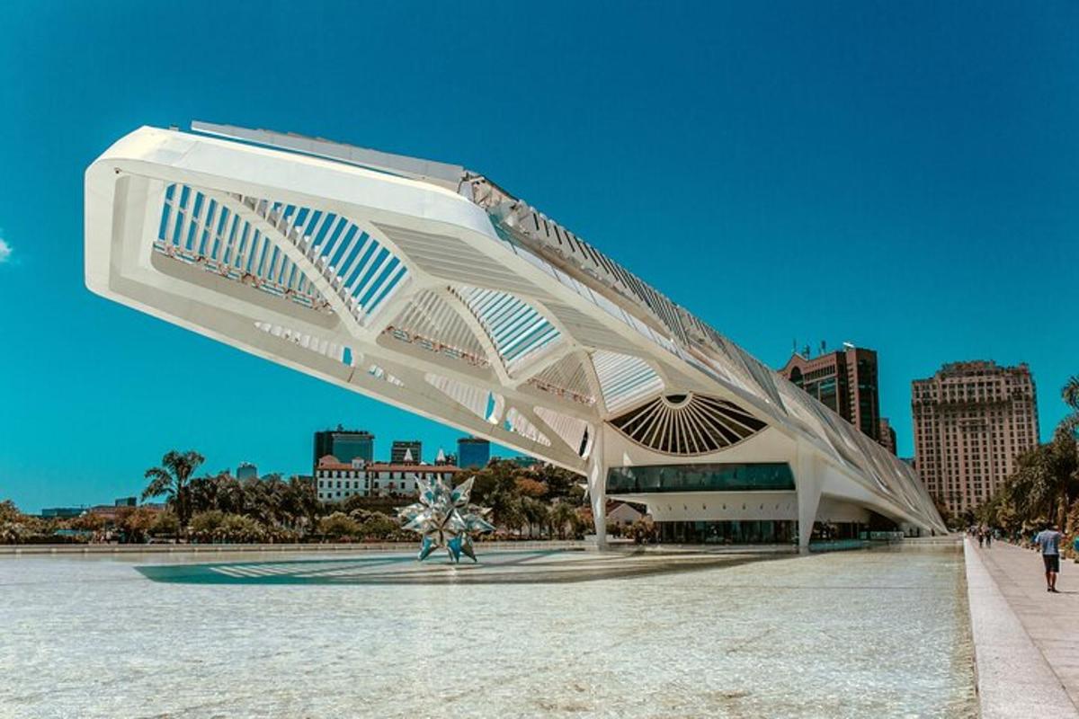 a white building with people walking in front of it
