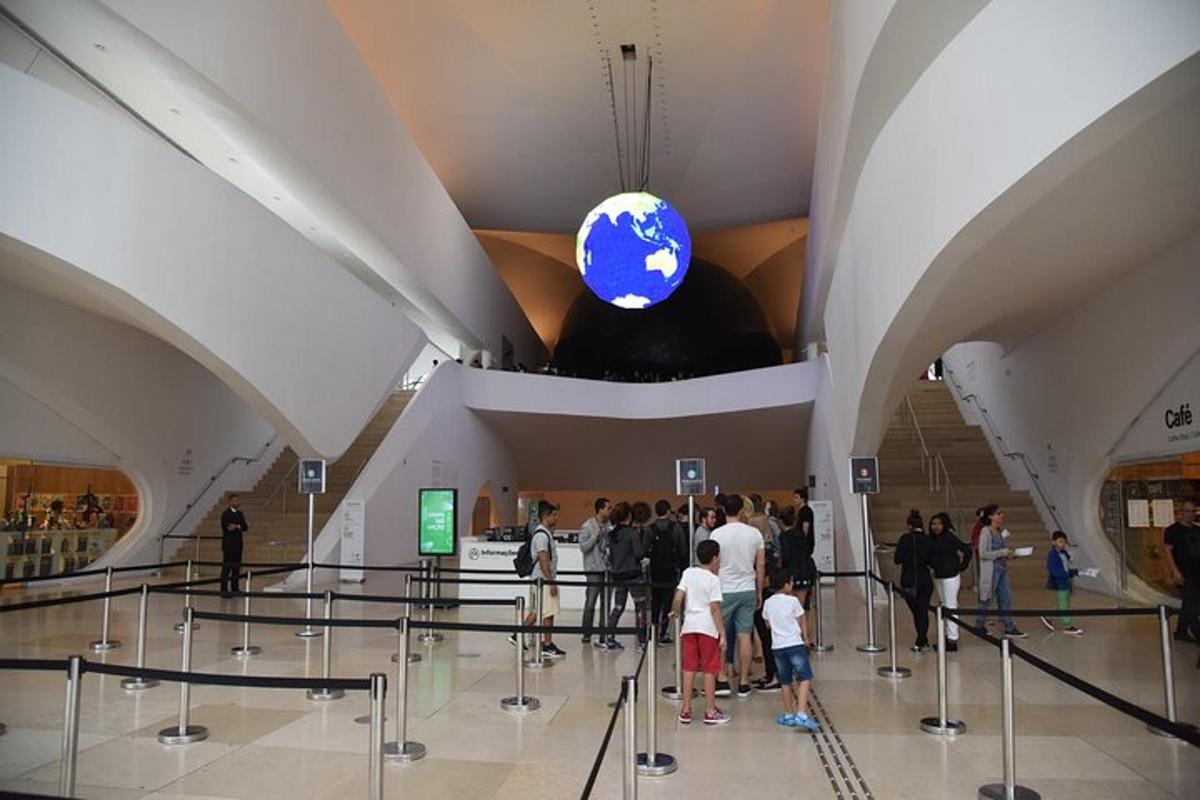 a group of people standing in a large building