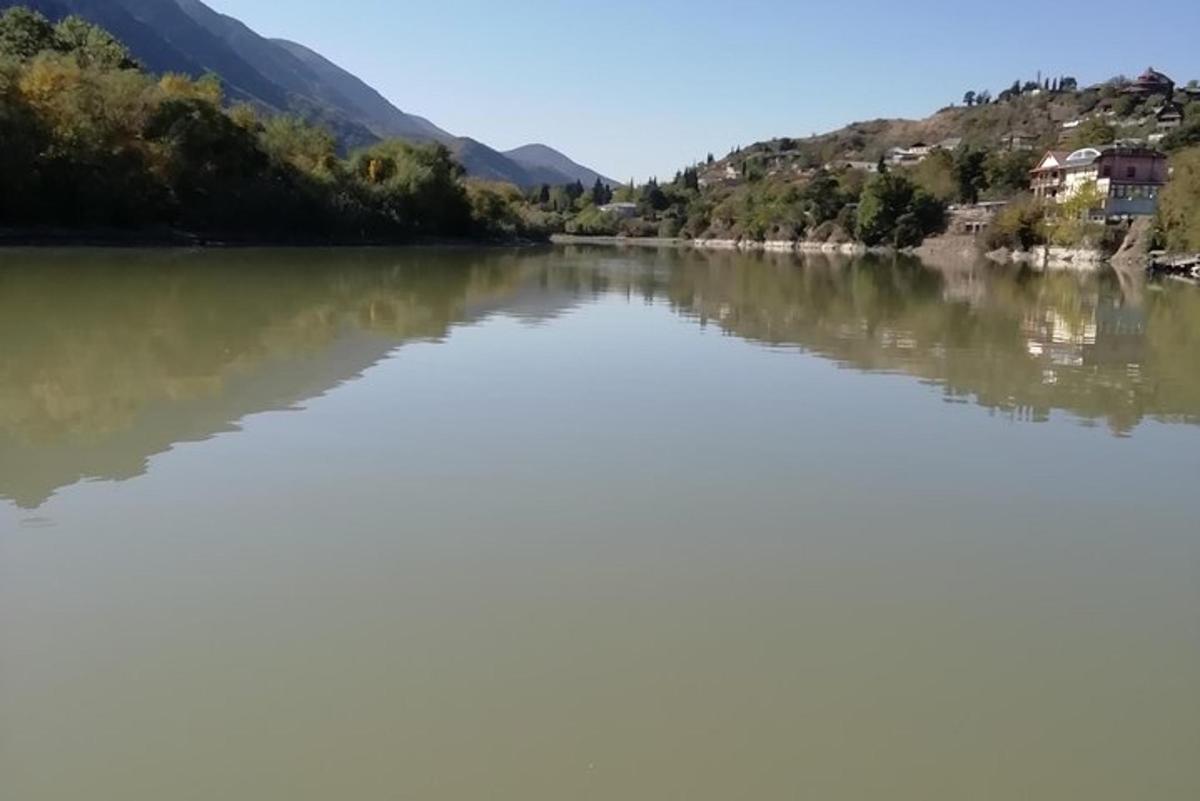 a view of a lake with mountains in the background