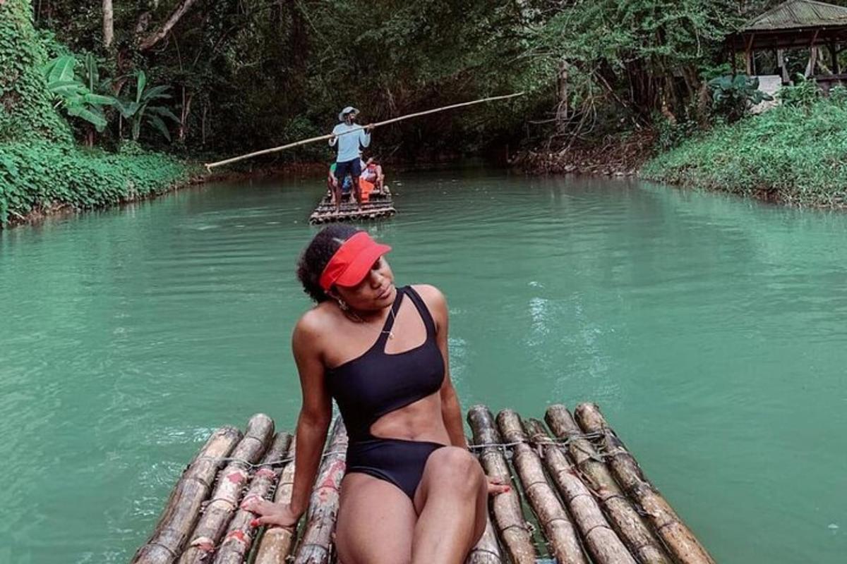 a woman in a swimsuit on a raft in a river
